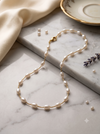 Luminous Oval Pearl Station Necklace in Gold